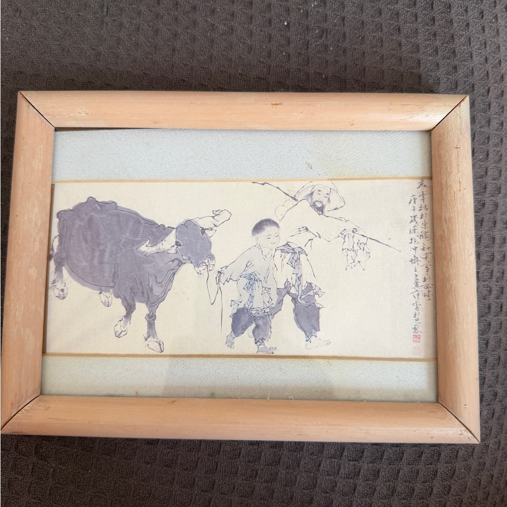 A unique antique Chinese painting depicting a boy, man and a buffalo